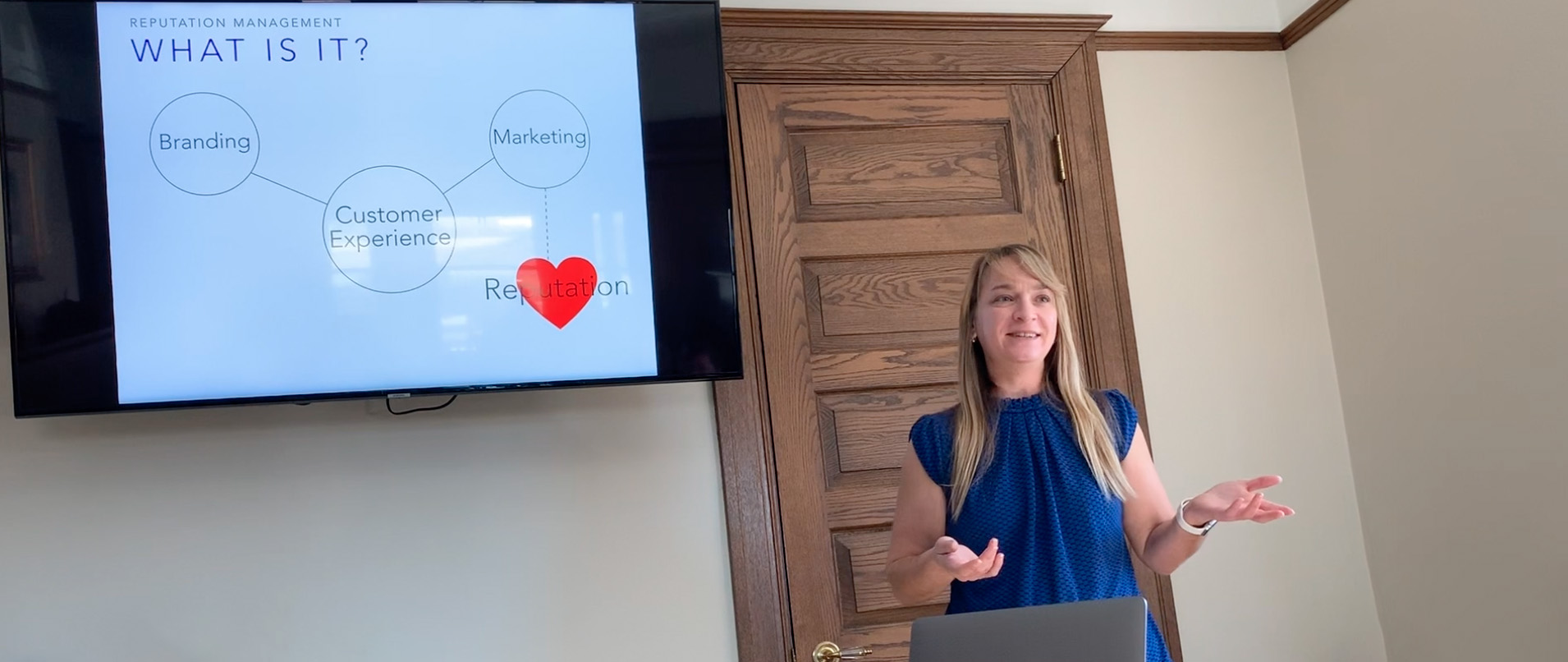 Pam presenting direct-booking strategy at an STR industry conference